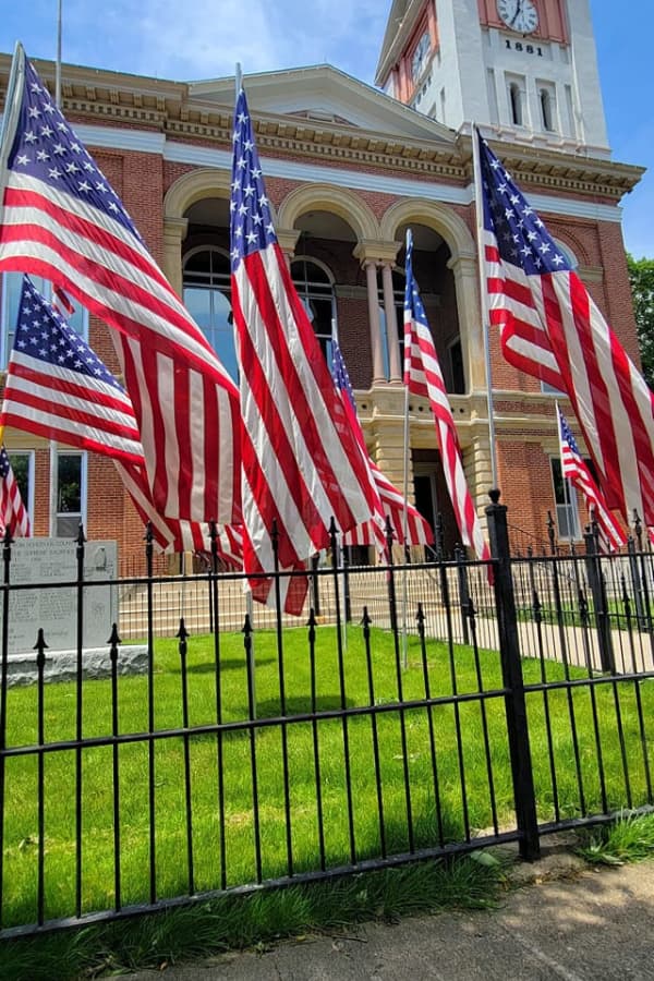 Schyler County Courthouse with flags in front